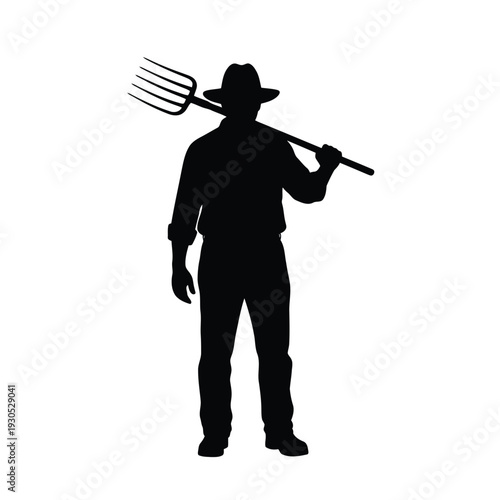 Farmer standing with pitchfork on shoulder, rural landscape, silhouette, outdoors, daytime, front view