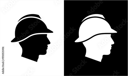 Silhouette of a worker wearing a hard hat, side profile.