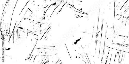 Abstract texture grunge made of diagonal streaks and distressed lines, black ink on a white background. grunge scratch patterns, chaotic linear noise. dirty monochrome pattern of the old worn surface.