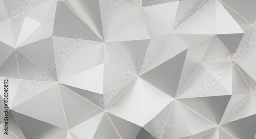 Geometric pattern of white and gray triangles forming a 3D effect.