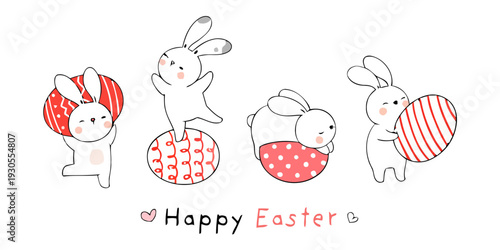 A group of bunnies are playing with Easter eggs on a table indoors.