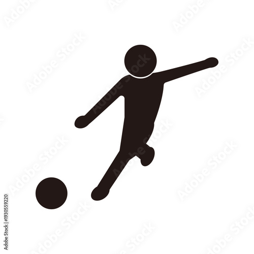 シュートするサッカー選手のシルエット