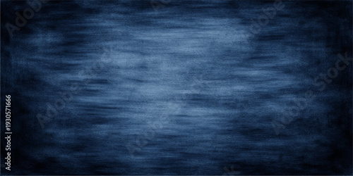 A dark blue grunge background with a textured chalk board surface featuring aged vintage patterns and a rough ancient wall material design