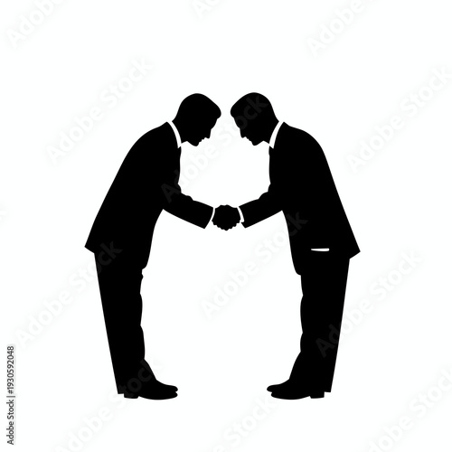 Silhouette of formal businessmen bowing and shaking hands as a sign of deep respect and professional greeting