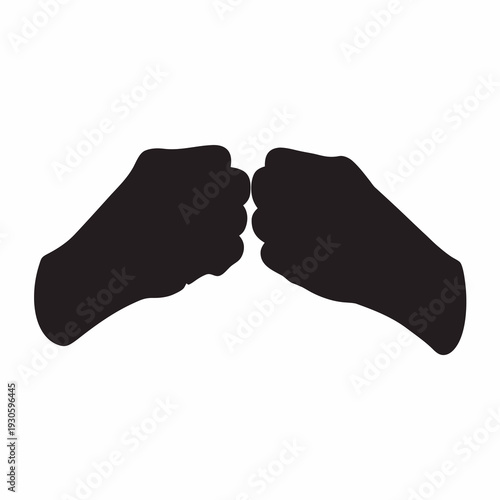 Two fists touching in a symbolic gesture of agreement or solidarity