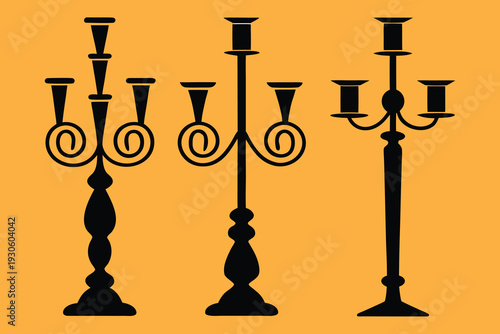 Stylized ornate candelabra silhouettes featuring intricate scrollwork, decorative candle holders, symmetrical design, bold orange background, vintage art, and decor.