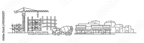 Roadside construction site with tower crane and concrete mixer truck beside retail storefronts for urban redevelopment background and design layout