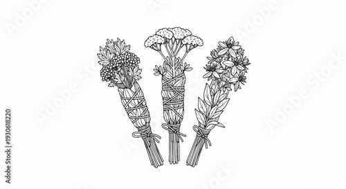 Three bunches of dried herbs tied with string