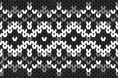 Contemporary black and white knitted yarn with an ethnic native pattern.