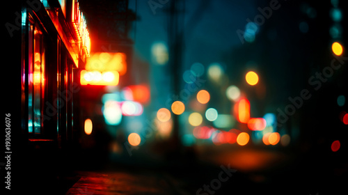 雨に濡れた夜の街路と滲むボケライトの反射