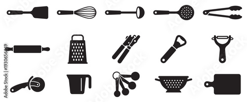 Kitchen utensils and cooking tools collection of various implements used for preparing and serving food in a modern home.
