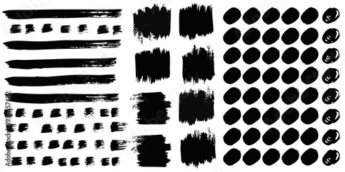Collection of black brush strokes and paint splatters on white background