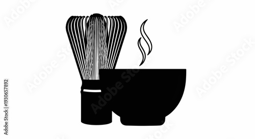 A whisk and a steaming bowl of tea, a simple representation of tea preparation