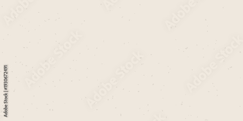 Cream colored background with scattered dark speckles and a grainy texture
