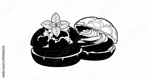 Two delicious cream-filled pastries topped with fresh mint leaves