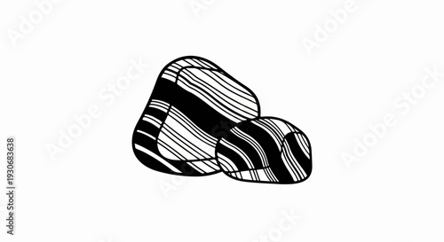 Two smooth, black and white striped pebbles artfully arranged on a plain white background