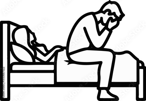 Troubled person sits on bed, head in hands, near partner sleeping