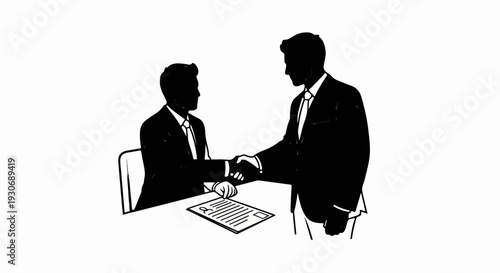 Two men in suits shake hands over a contract on a table