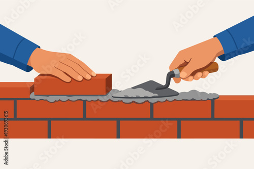 Builder hands creating brick wall with trowel and mortar for construction project