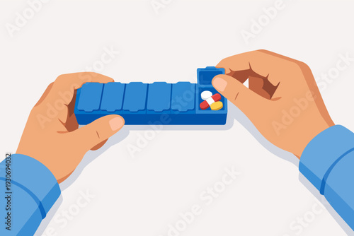 Hands holding pill organizer with daily medicine for health and medical routine