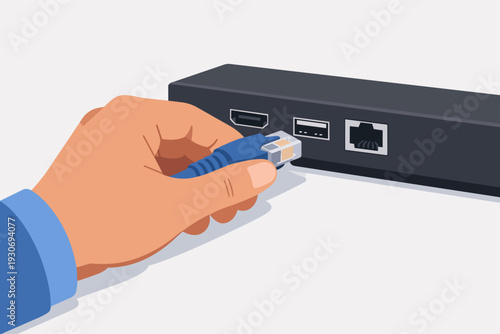 Hand connecting ethernet cable to network port for internet and data transfer