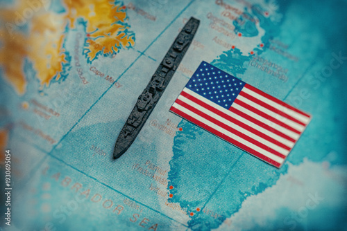 US flag and warship on Greenland map illustrating protection and control.