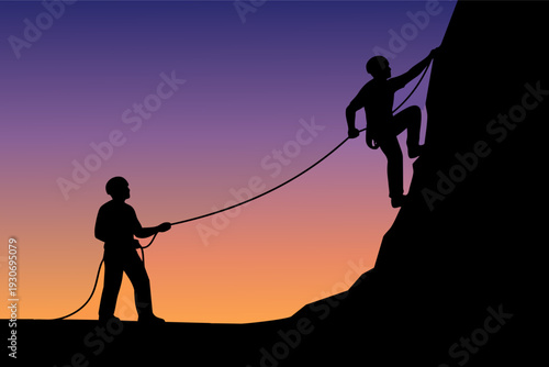 Two people climbing at sunset, one supporting the other, demonstrating teamwork and trust