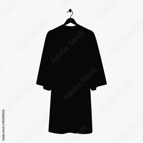Elegant black coat hanging on a hanger in modern style