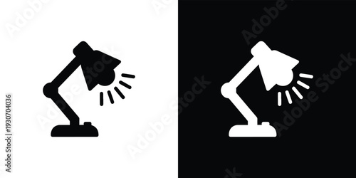 Black and white desk lamp with rays on white and black backgrounds lamp black and white light symbol