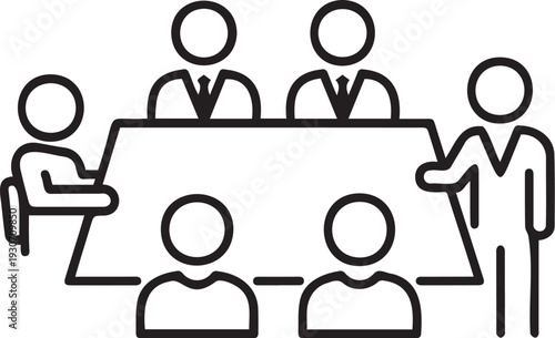 Group of people in a business meeting with a presentation being given by a standing person