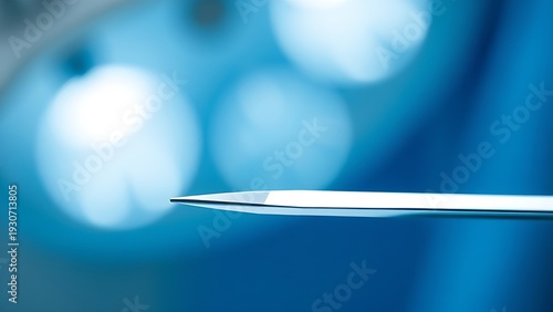 surgical. A single surgical blade under bright lighting. STEM education sheets, lab safety posters, designed for STEM education and laboratory safety posters and biotech research communications.