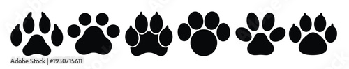 set of black silhouettes of paw print icons black and white