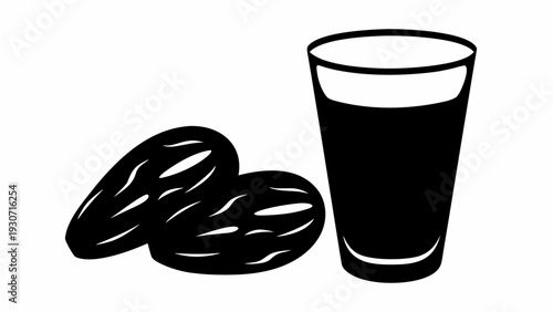 Freshly baked bread with glass of dark beverage