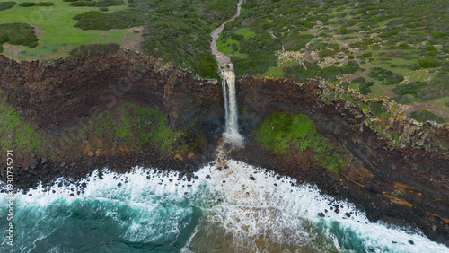 Dramatic waterfall flowing into the sea in western Sardinia