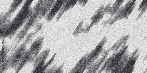 Abstract monochrome background with diagonal blurred streaks and grainy texture creating a sense of motion and depth in a grayscale artistic design