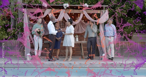 Standing couple exchanging vows on poolside deck, bride in white dress, confetti overlay, pergola