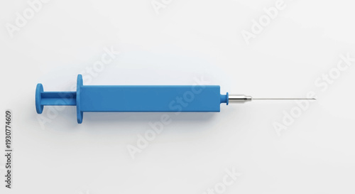 A detailed image of a blue medical syringe laying on a blank white surface