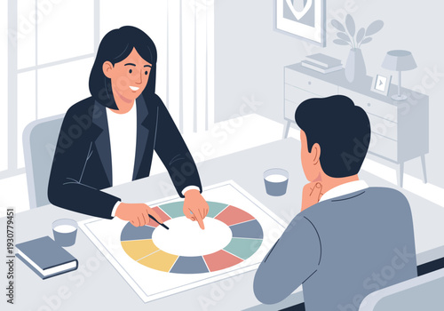 Business consultant discussing a segmented diagram with a client in a modern office for strategic planning concept and professional guidance