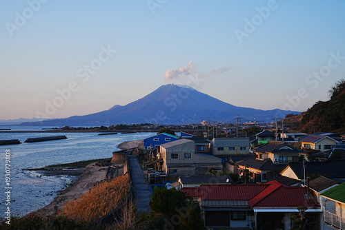 Fotografi Dramatic Sunset over Mount Sakurajima and Kinko Bay in Kagoshima Kyushu Japan -