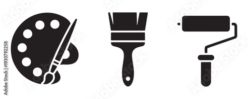 A collection of art supplies including a palette, brush, and roller