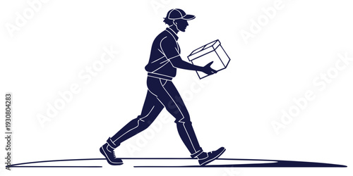 A person carrying a box while walking down the street in a city.