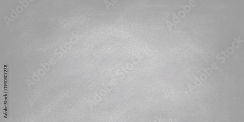 A vintage gray concrete wall texture with a rough, brushed surface serves as a blank grunge backdrop design