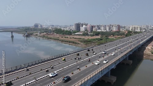 Aerial Drone View of Surat City Highway Bridge with Heavy Traffic on Bright Sunny Day