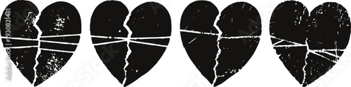 Four distressed black hearts with cracks and scratches, grunge broken love symbols