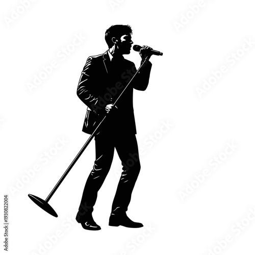 Silhouette of a male singer performing on stage with microphone and stand in a dynamic live show.
