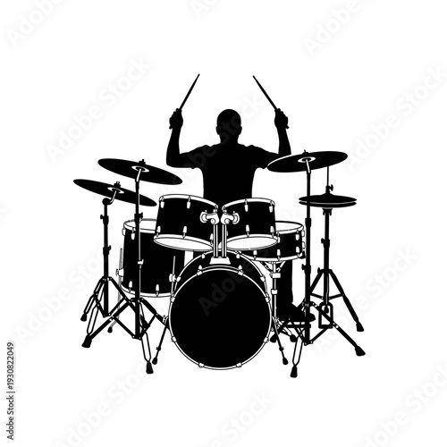 Silhouette of a drummer performing with a full drum kit and raised sticks on stage in concert lighting.