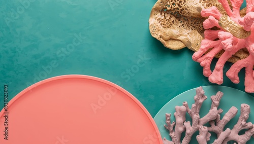 Colorful Coral and Decorative Items on a Teal Background