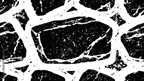 black and white textured stone wall pattern with irregular shapes and rough surfaces