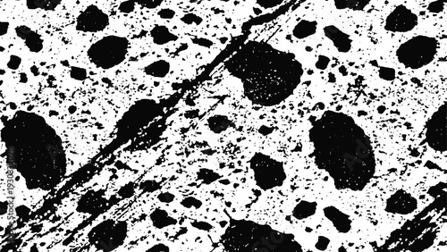 Black and white terrazzo pattern with large and small irregular splotches, modern decorative surface texture