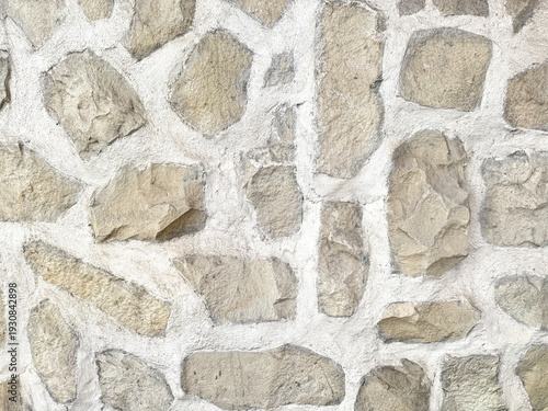 Canvastavla Close up of natural random cut beige yellow cobble stone flattened on a surface